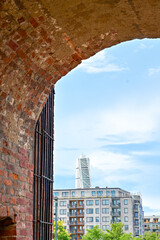 View through the archway of Malmöhus Castle or Malmöhus slott to the famous skyscraper Turning...