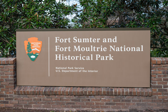 A National Park sign for Fort Sumter and Fort Moultrie in Charleston South Carolina.