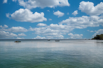 Fototapeta na wymiar Palma island seen from a boat with sea and blue sky. San Bernardo Colombia. 