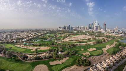 Fototapeta na wymiar Dubai Marina skyscrapers and golf course morning timelapse, Dubai, United Arab Emirates