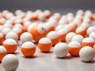 Orange ping pong balls surrounded with white balls one - obrazy, fototapety, plakaty