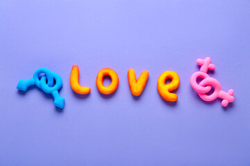 Word LOVE with symbols of man and woman on lilac background. LGBTQ concept