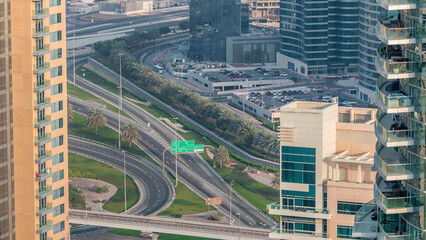 Aerial view of a road intersection in a big city timelapse.