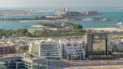 Palm Jumeirah and internet city aerial timelapse. Dubai, United Arab Emirates