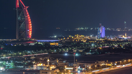 Aerial view of Burj Al Arab hotel from Internet city night timelapse.