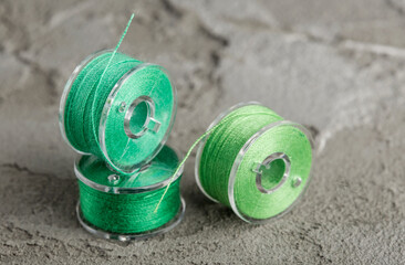 bobbins for a sewing machine with bright threads