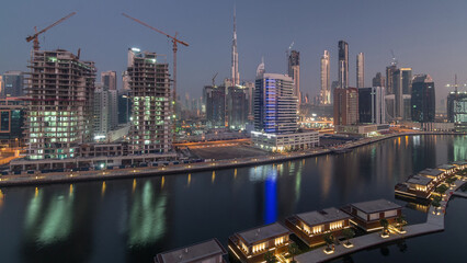 The rhythm of the city of Dubai from night to morning aerial timelapse