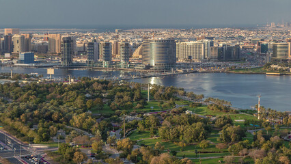 Fototapeta premium View of new modern buildings in luxury Dubai city, United Arab Emirates Timelapse Aerial