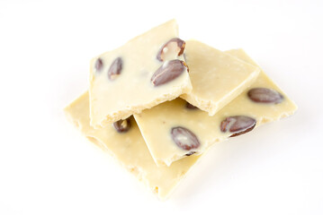 Pieces of delicious chocolate bar isolated