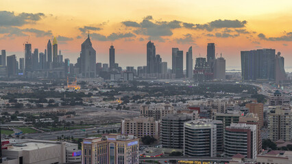 View of transition from day to night in Dubai city, United Arab Emirates Timelapse Aerial