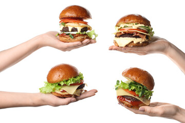 Female hands holding tasty burgers on white background