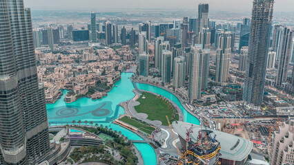 Amazing aerial view of Dubai downtown skyscrapers day to night timelapse, Dubai, United Arab...