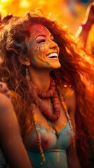 Ecstatic woman covered in colorful powder at a music festival