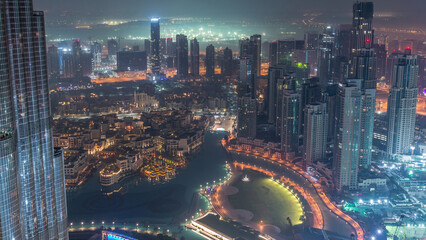 Amazing aerial view of Dubai downtown skyscrapers night to day timelapse, Dubai, United Arab Emirates