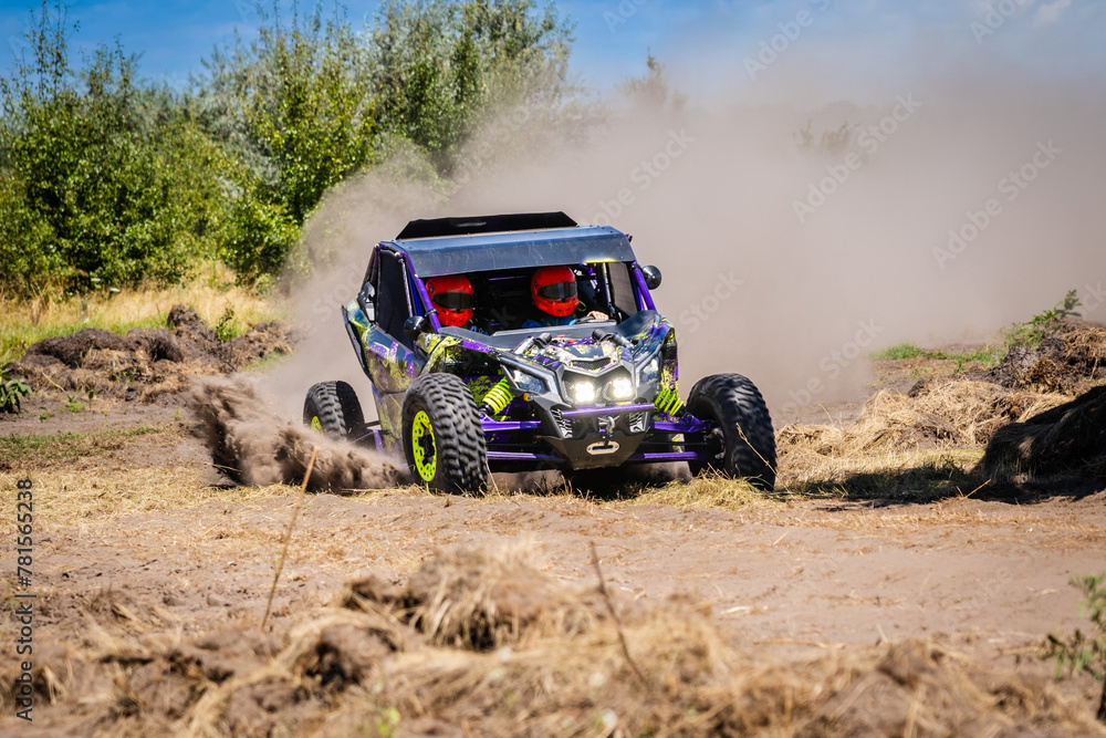 Wall mural utv vehicle offroad kicking up sand on dune. extreme, adrenalin. 4x4.