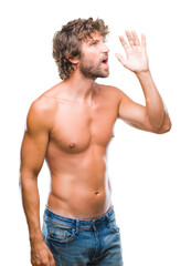 Fototapeta premium Handsome hispanic model man sexy and shirtless over isolated background shouting and screaming loud to side with hand on mouth. Communication concept.