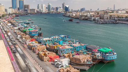 Loading a ship in port timelapse in Dubai, Deira creek, UAE.