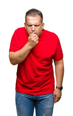 Middle age arab man over isolated background feeling unwell and coughing as symptom for cold or...