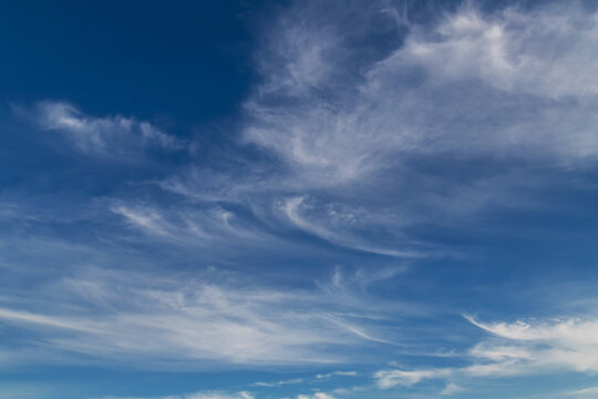 Blue sky cirrus clouds.