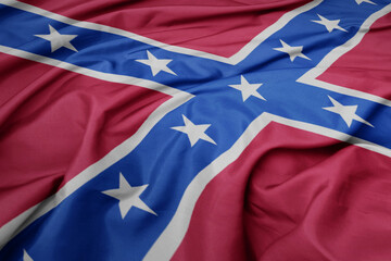 waving colorful confederate jack flag .
