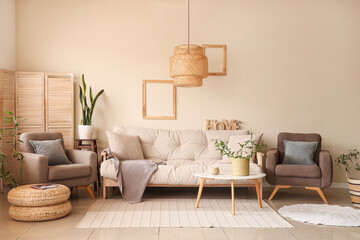 Modern living room with cosy white sofa and bamboo plant
