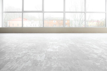 View of stylish clean laminate floor in empty room