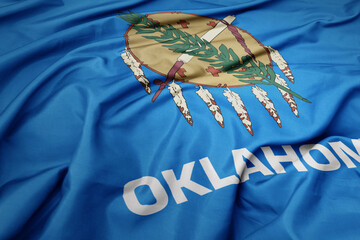 big waving national flag of oklahoma state. macro shot