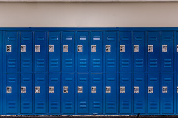 Empty school hallway with blue metal student lockers	 - obrazy, fototapety, plakaty