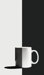 Stylish minimalist black and white cup with coffee against a two tone black and white backdrop.