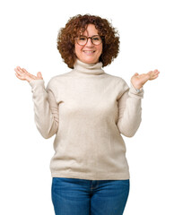 Beautiful middle ager senior woman wearing turtleneck sweater and glasses over isolated background Smiling showing both hands open palms, presenting and advertising comparison and balance