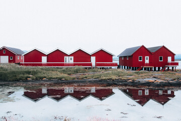 The red fishermen's huts on the Atlantic ocean in the village of Bud, Norway.