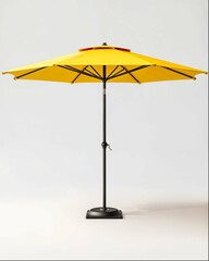 Fototapeta premium yellow outdoor umbrella with black metal stand, white background, product photo