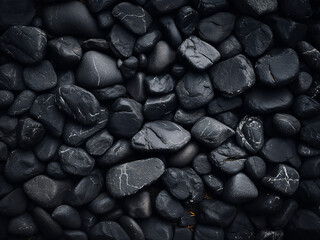 The nature abstract background reveals the porous texture of black stone - obrazy, fototapety, plakaty