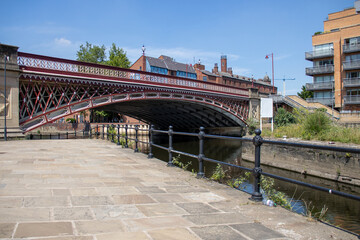 The historical Leeds bridge over the canal in the city centre in West Yorkshire in the UK