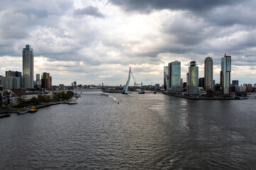 City centre of Rotterdam, view from the Erasmus Bridge on Nieuwe Maas river in Netherlands.