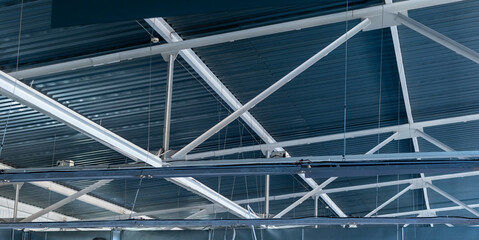Industry. Lightweight load-bearing metal roof structures inside an industrial facility