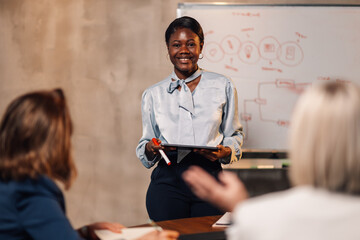 Interracial businesswoman having presentation during the meeting at boardroom