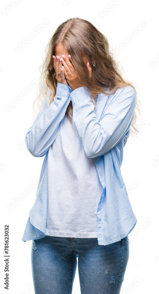 Sticker beautiful young blonde woman over isolated background with sad expression covering face with hands w