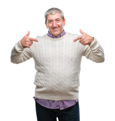 Handsome senior man wearing winter sweater over isolated background looking confident with smile on...