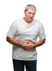 Handsome senior man over isolated background with hand on stomach because nausea, painful disease feeling unwell. Ache concept.