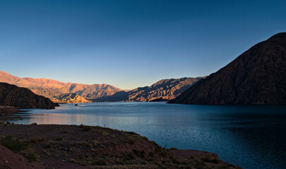 Fototapeta na wymiar Lake Potrerillos, in Mendoza, Argentina, elevated view at dawn.