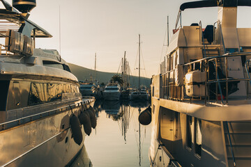 Amazing view of a marina and boats in Porto Montenegro on a sunset.