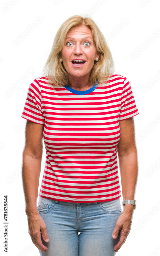 Canvas Prints Middle age blonde woman over isolated background afraid and shocked with surprise expression, fear and excited face.