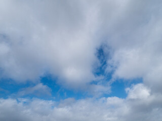 Blue cloudy sky. Nature background texture for design.
