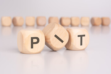 text 'PIT' - Personal Income Tax - on wooden cubes