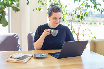 Woman Enjoying Coffee During Work From Home