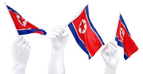 Hands waving North Korea flags isolated on white - 781649254
