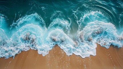Aerial view of waves crashing on beach