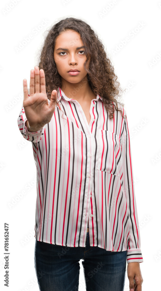 Canvas Prints Beautiful young hispanic woman doing stop sing with palm of the hand. Warning expression with negative and serious gesture on the face.