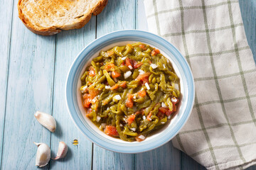 Salad of roasted peppers with onions and tomatoes. Mediterranean cuisine. Vegetarian and vegan food.